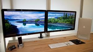 Two Screens on desk.