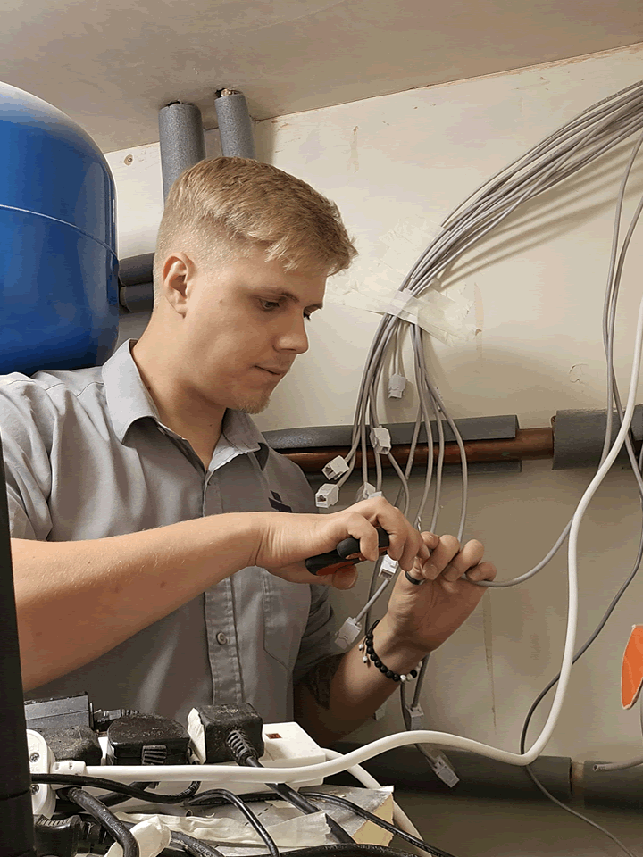 IT Positive Staff member installing ethernet cables